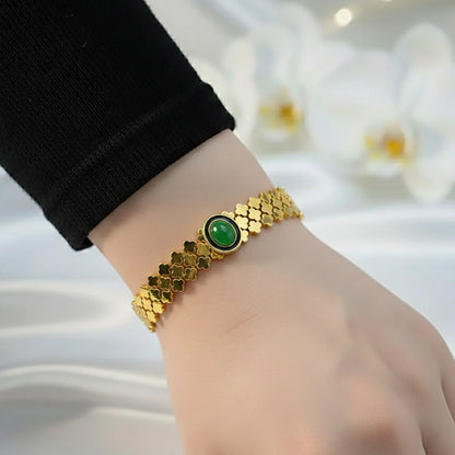 Gold Clover Bangle with Green Gemstone